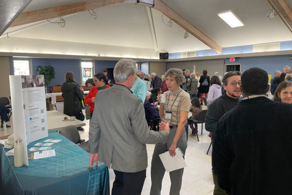Representatives from CalNEXT, TECH Clean California, PG&E, Energy Solutions, Good Fit Plumbing, and We Can Do It Plumbing meet with community members during the weekly coffee service following the Montclair Presbyterian Church service.